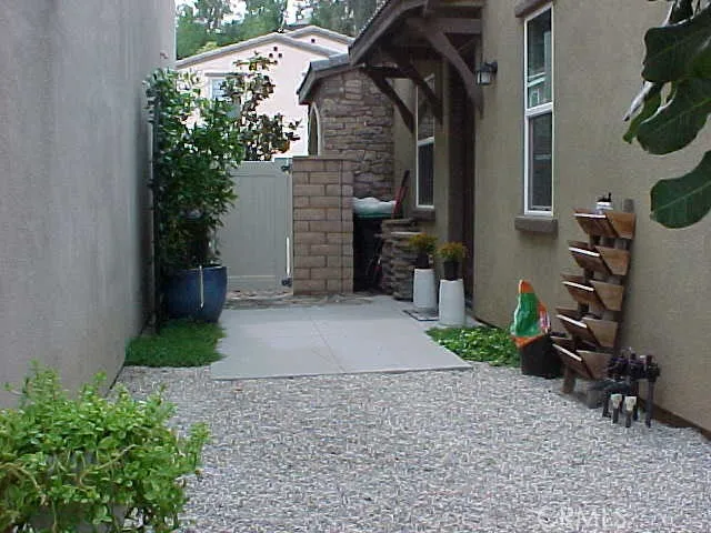 Side Yard and Side Entrance to Home
