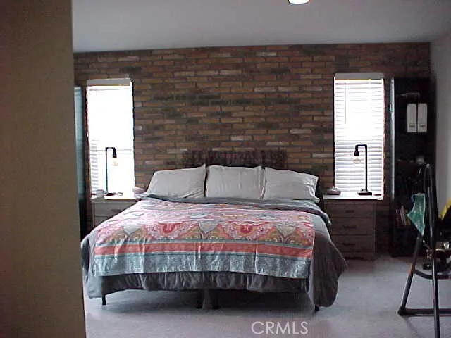 Brick Wall Feature in Master Bedroom