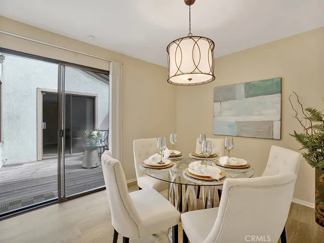 Access to the outdoor patio brings the outside in for al fresco dining options.