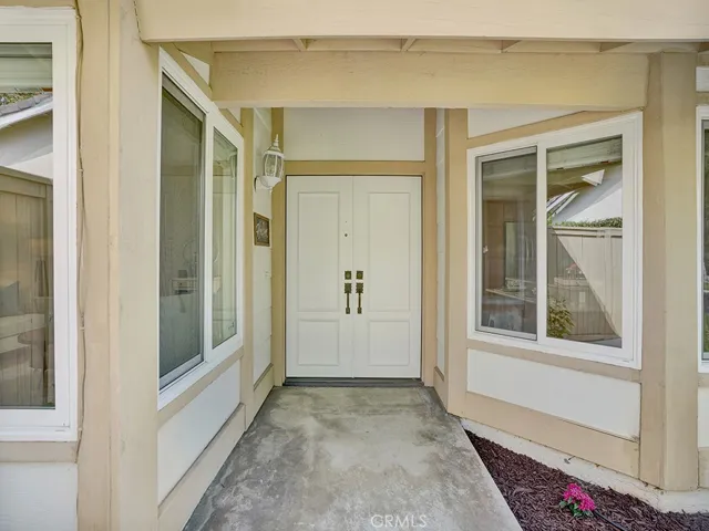 Through the double door entry, a beautiful home awaits.
