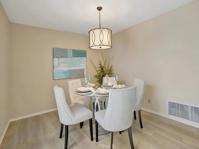The dining room is adjacent to the kitchen.