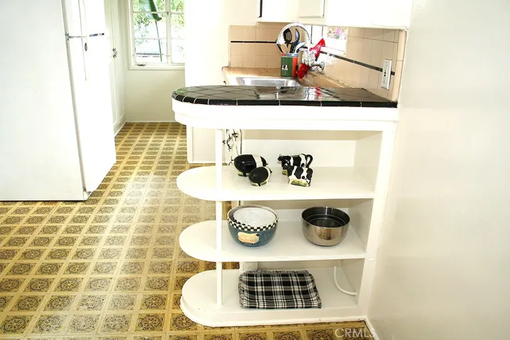Classic kitchen open storage shelving.