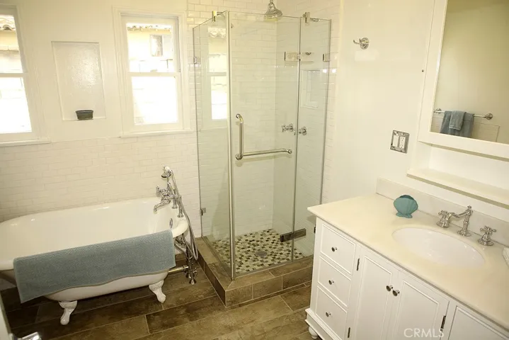 Updated Full Bathroom with Modern Claw Tub, Showerhttps://matrix.crmls.org/Matrix/MediaManager/ShowImage.aspx?tbl=50&mtid=1&tmui=359574088&mf=PU42546214&w=128&h=96&q=99&md=0001-01-01%2000:00:00.000 and Vanity