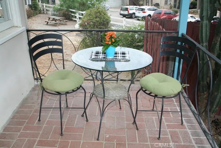 Cozy outside dining area off kitchen