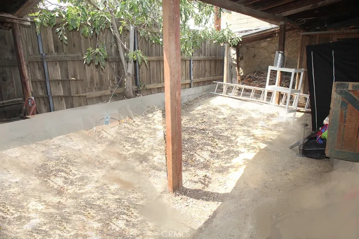 Paddock with exit to alley
Chicken Coop also there.