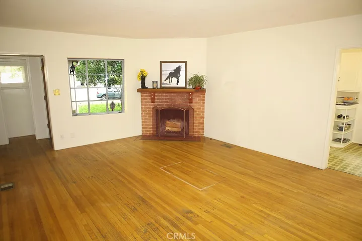 Living Room - Spacious with dining area space.
TLC needed on flooring.