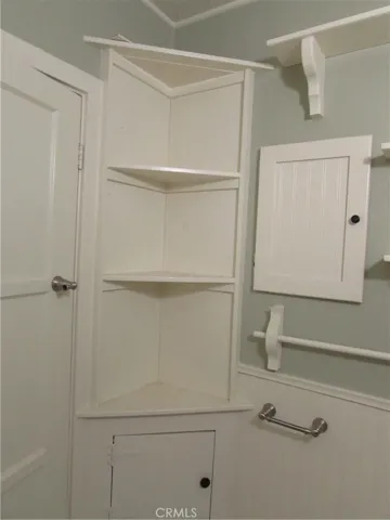 Built in storage in the hall bathroom