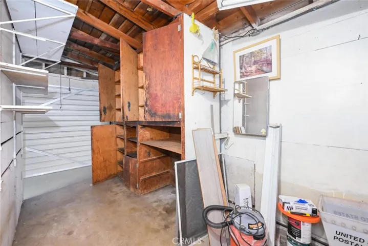 Seller can remove cabinets and wall prior to close, if buyer requests.