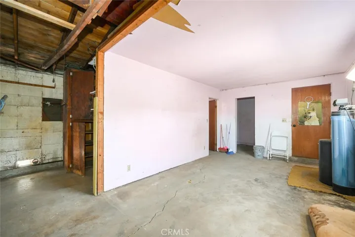 Garage. Seller can remove cabinets and wall prior to close, if buyer requests.