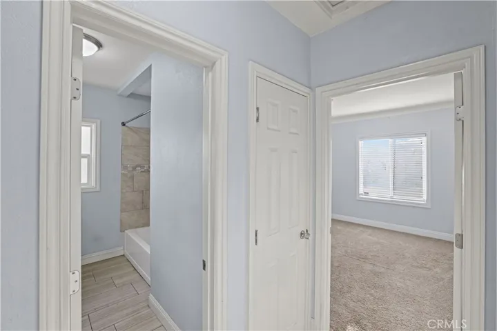 Hall with bathroom