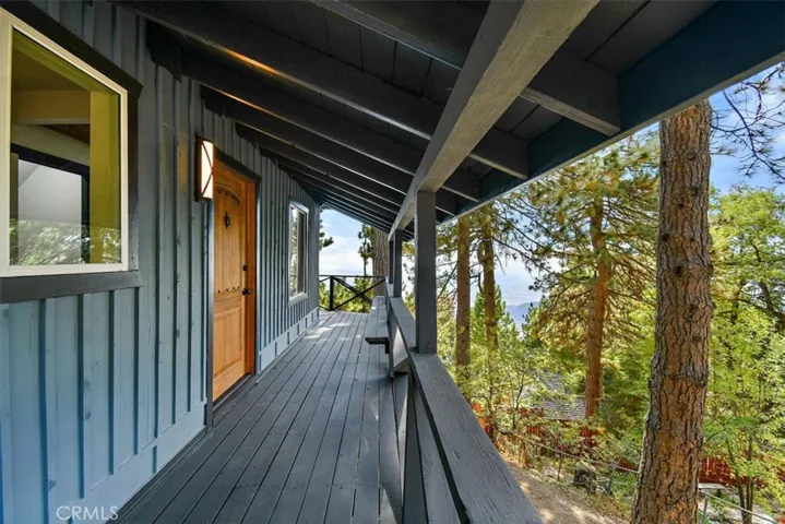 Wrap around balcony leading to the front door.