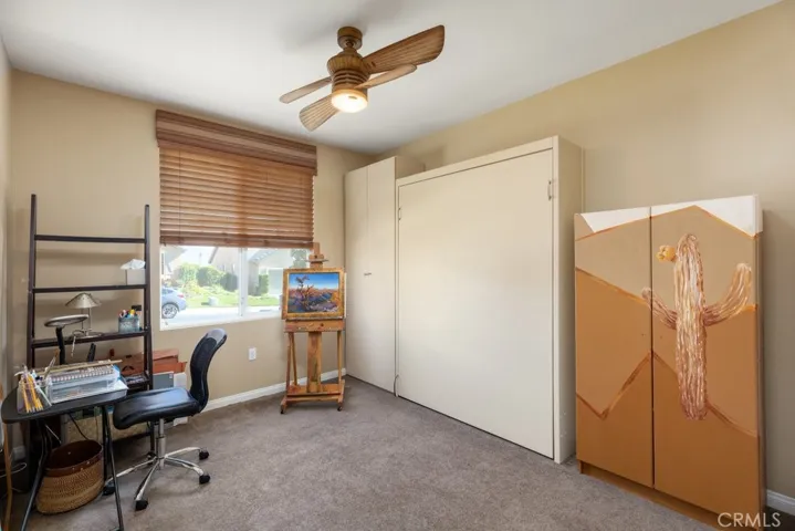 Guest bedroom - built-in Murphy bed in middle - cabinet to right of Murphy bed does not stay with purchase