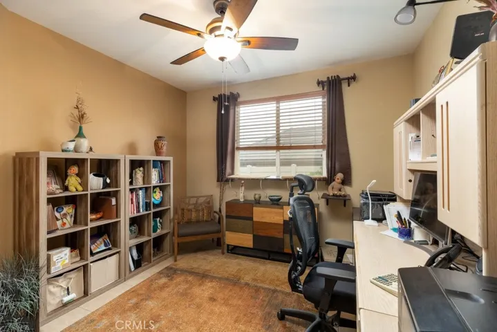 Den/office with custom window coverings