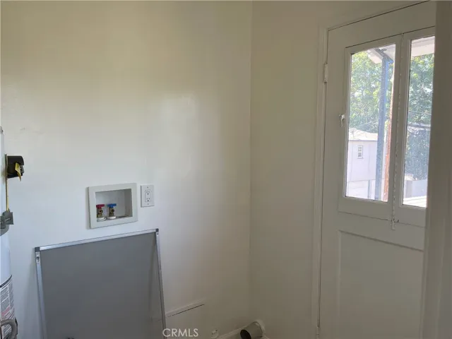 Utility room for in unit washer/dryer