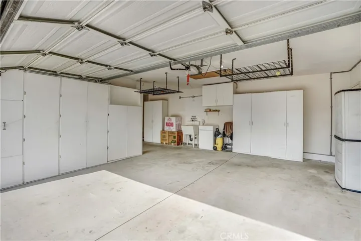 3 car garage with 10 storage cabinets!