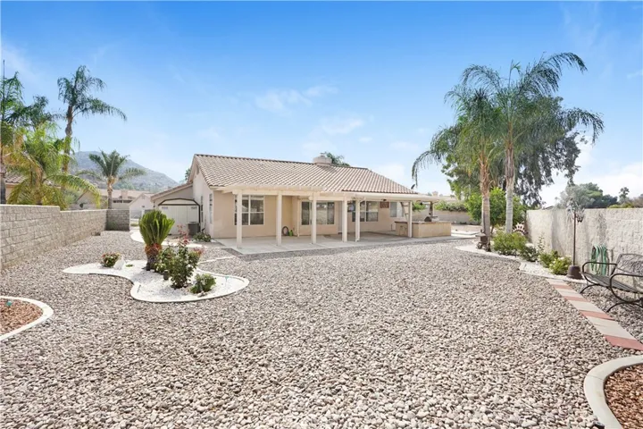 Maintenance free landscaping with block wall on all sides.  Large storage shed!