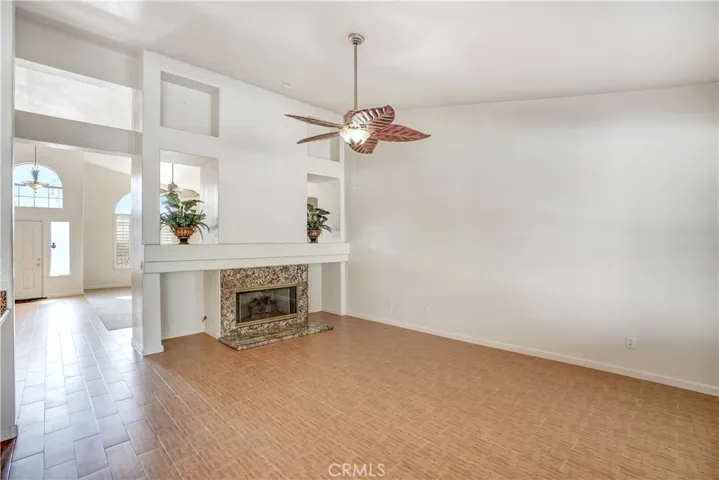 Ceramic tile and decorative ceiling fan in family room