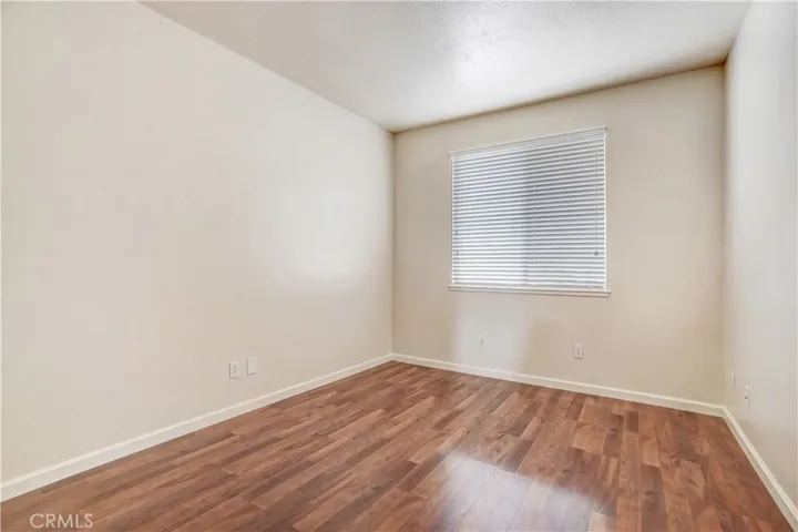 Bedroom 3 with laminate flooring