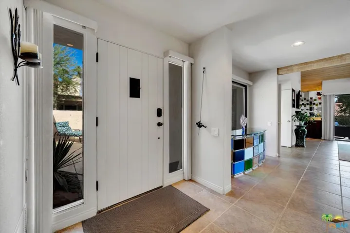 Entry with side light panels.