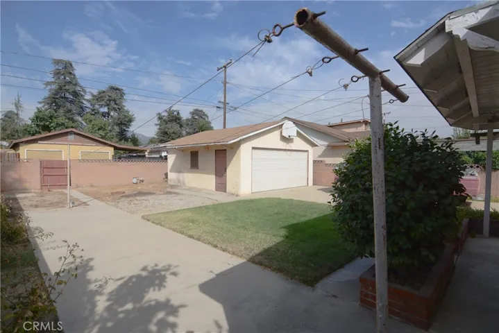 Block walls and fenced in backyard