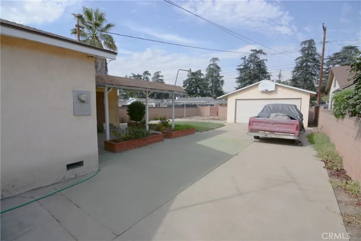 Driveway extends back to the detached garage