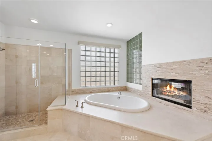 Master Bath With Double Sided Fireplace - Separate Shower