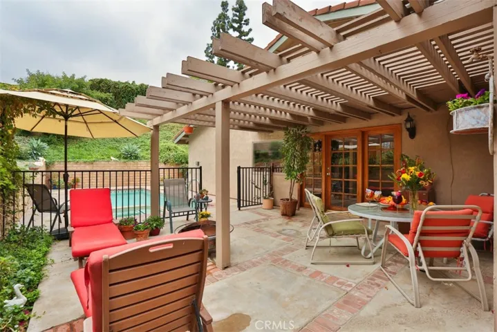 Covered courtyard, brick ribboned patio