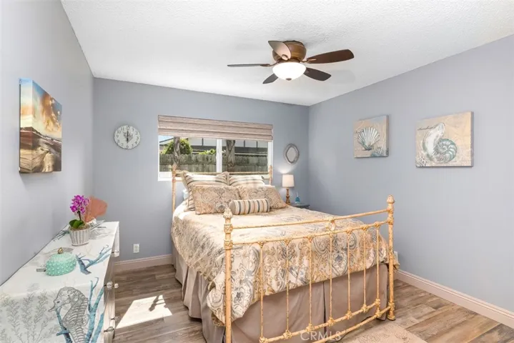 The middle bedroom, holds a queen bed and also has a large closet against hallway wall.