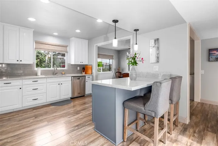 Two guests can comfortably sit at island and keep the cook company or a perfect spot for morning coffee. All countertops are quartz.

