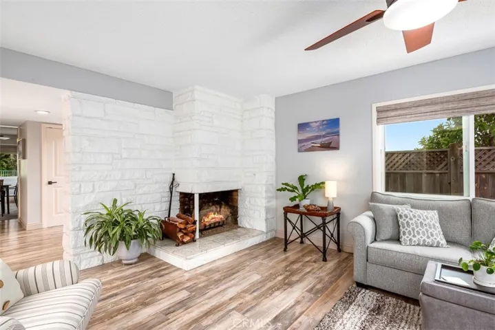 The fireplace originally built as wood burning has a gas starter if you desire fire ice or imitation logs.