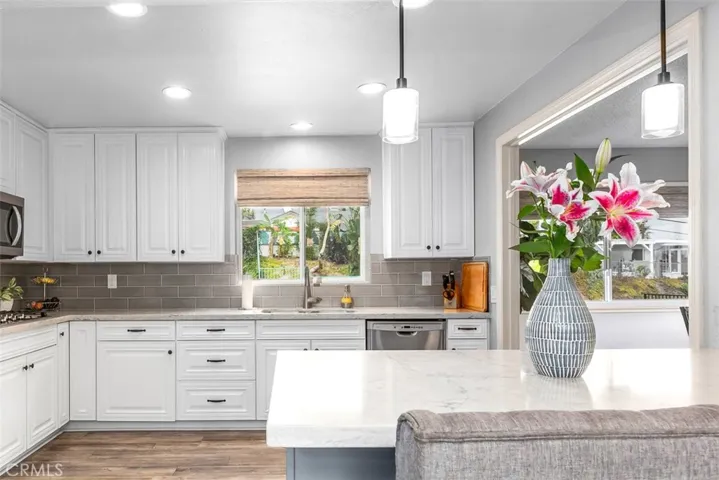 The kitchen is large enough that two or three people can easily be cooking or helping at the same time.