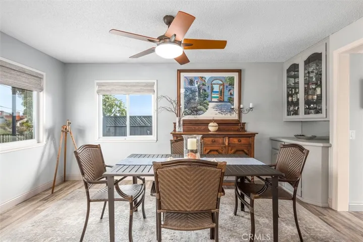 Looking across the dining room, rather than length, this room easily sits 8 people. Door at right is to Foyer.