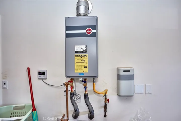 This home features a tankless water heater and leased electric solar!