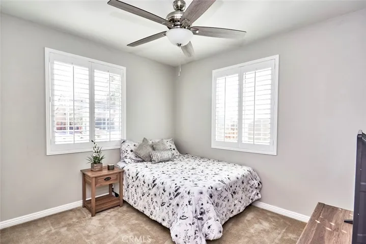 Bedroom 3 has two windows & plantation shutters