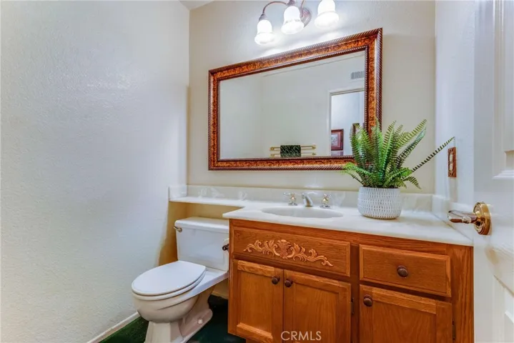 Guest bathroom is first off the hallway.