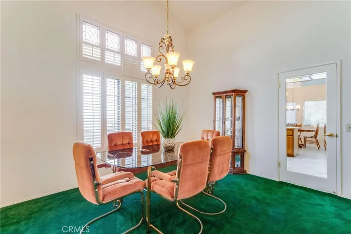 Notice the glass door into the kitchen.