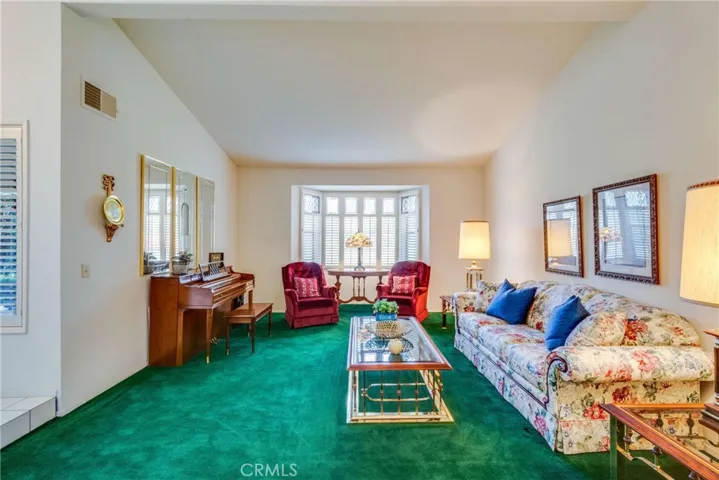 The living room is spacious and offers lots of light.