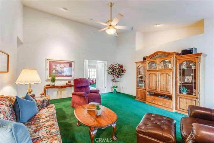 Another view of the family room, which is lovely and has high ceilings.
