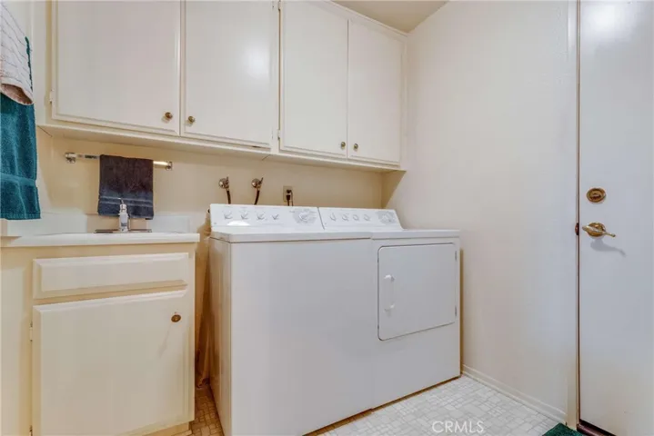 Indoor laundry with the sink.