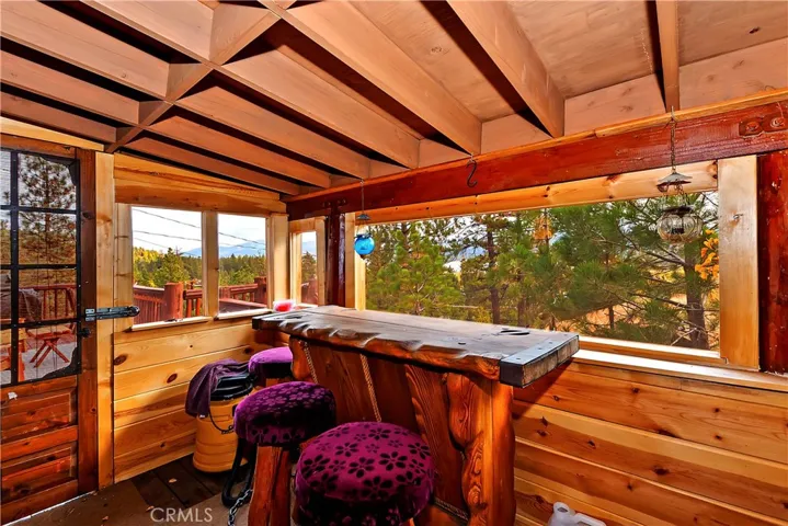 SEATING BAR IN JACUZZI ROOM WITH LAKE AND MOUNTAIN VIEWS