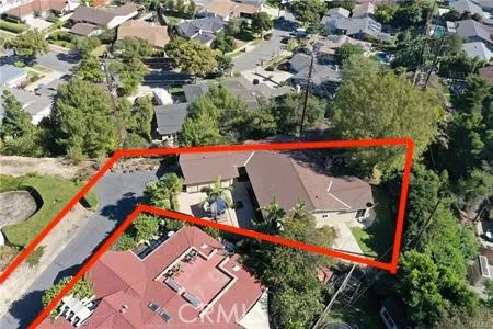 Red boundary lines in drone photos shown are an approximation of flat, useable lot, though the actual property boundaries extend beyond. Buyer to verify.