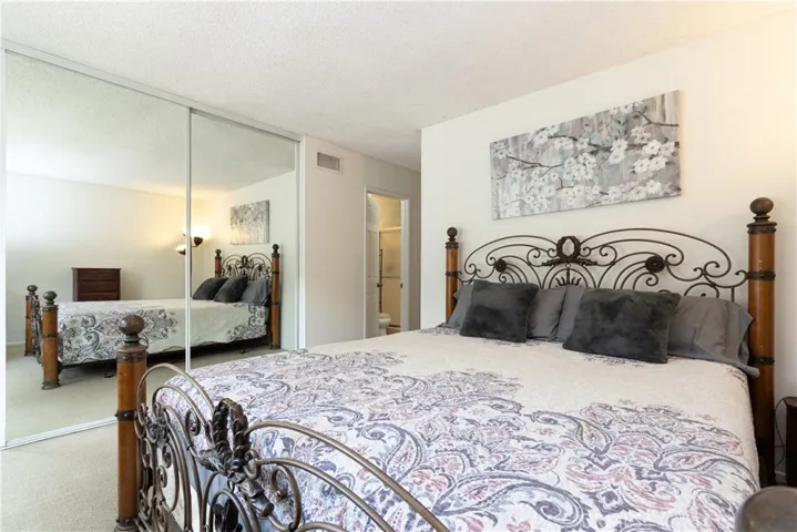 Master Bedroom with large closet with mirrored doors