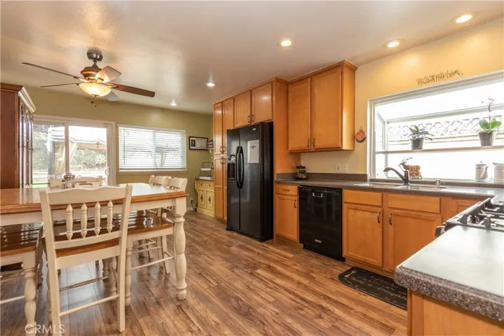 Large Eat In Kitchen with beautiful upgraded cabinets and Corian counters
