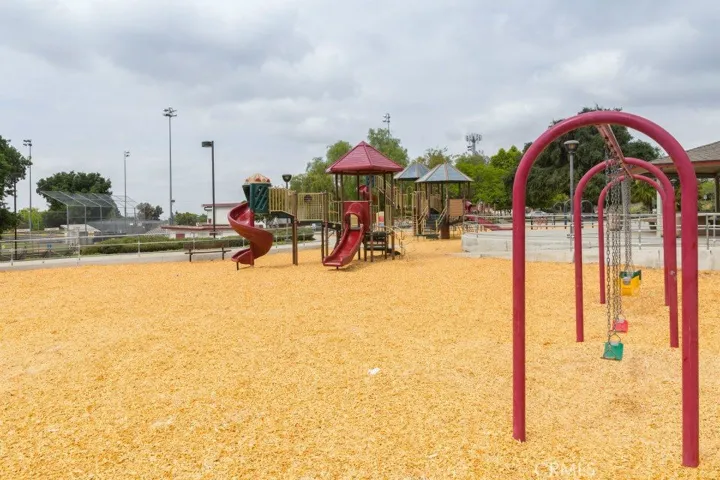 San Antonio Park boasts a playground with two play structures and swings.