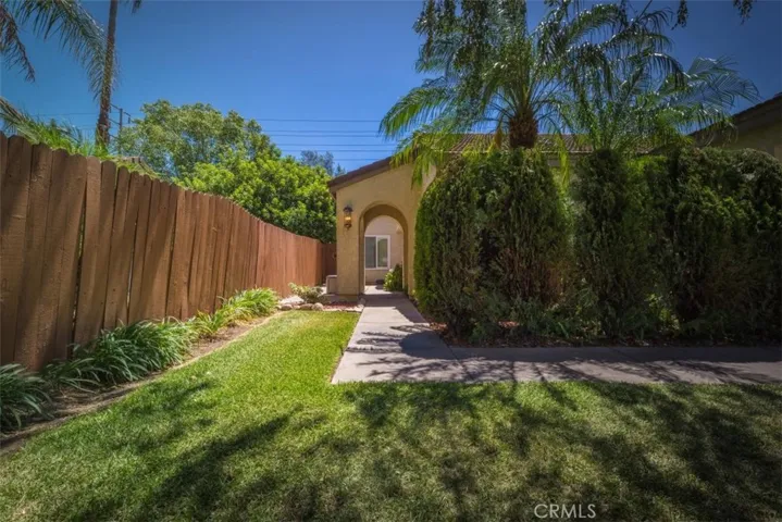 View of the attractive archway from the front lawn.