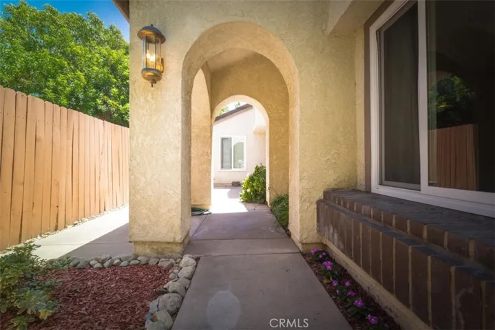 Attractive archway leading the front entry.
