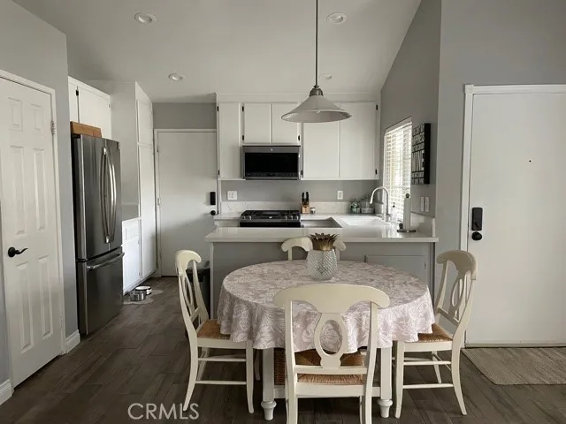 Dining area, beautiful porcelin tile throughout the house.
