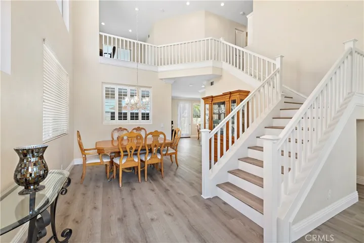 Imagine walking into your home every day and looking at this!! The grand staircase and two-story ceilings are stunning!