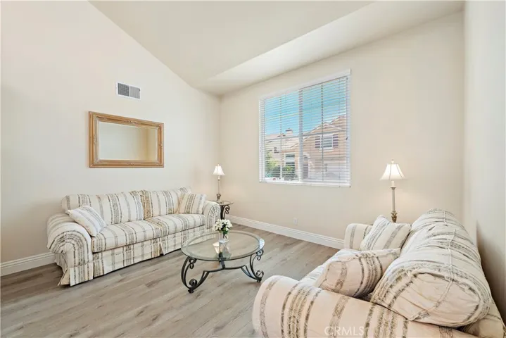 The living room is in the front of the house and is ideal for more intimate gatherings or a separate kids area.