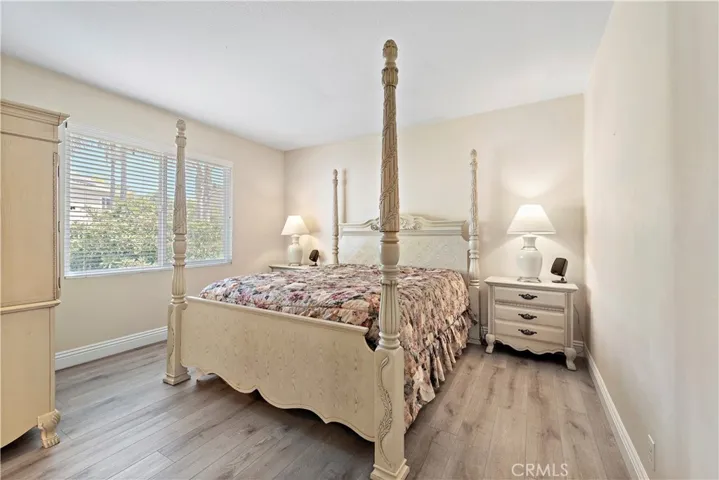The master bedroom has enough space for all your furniture. Notice the luxury vinyl flooring-it's throughout the entire home!